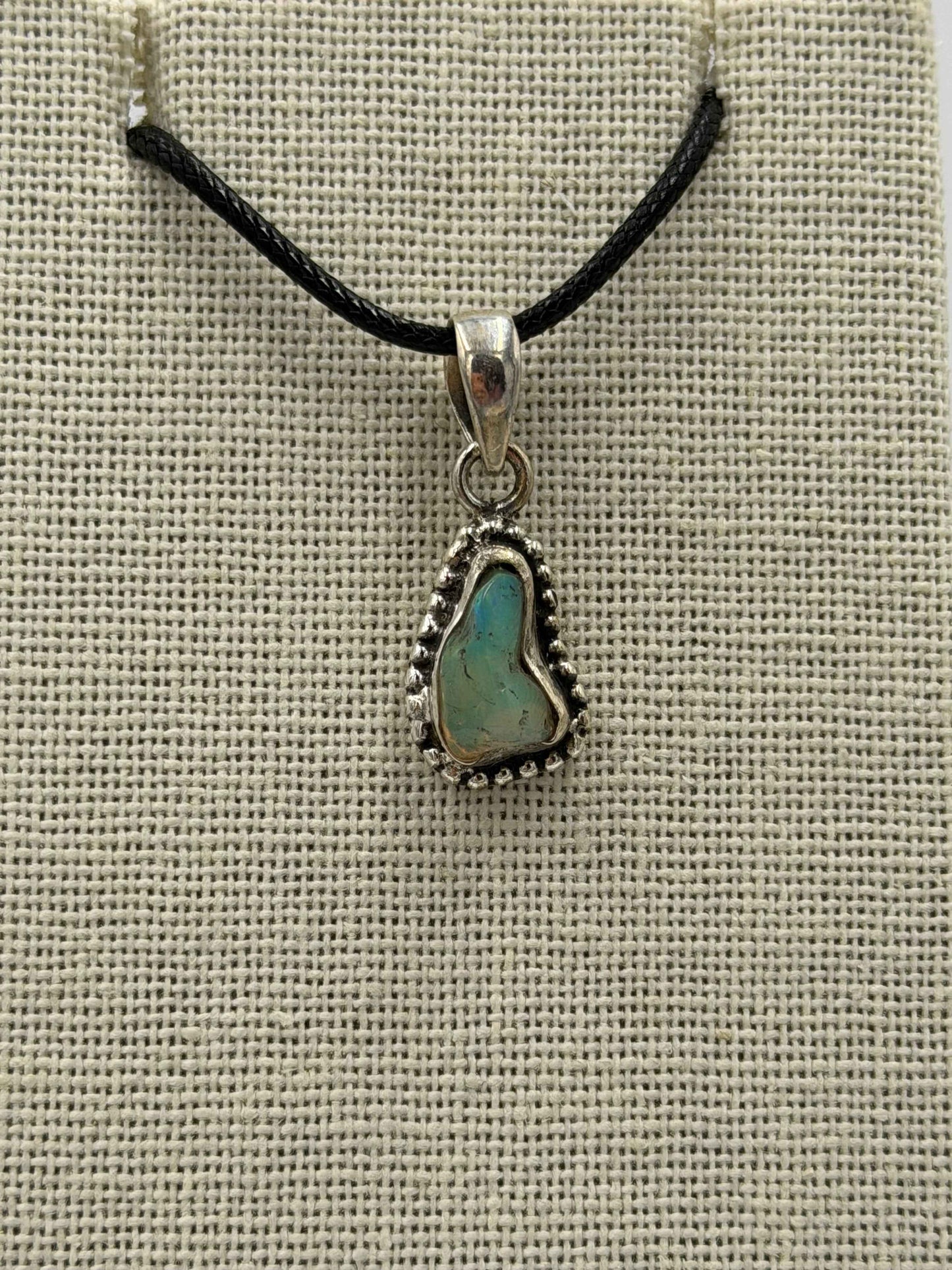 Sterling Silver Bezeled Raw Ethiopian Opal Pendant
